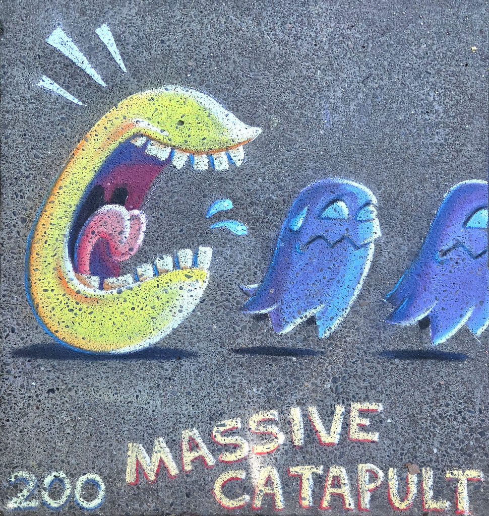 The finished artwork for my Chalk It Up 2026 square. The illustration is of a Pac-Man with open mouth and teeth chasing two scared ghosts. Underneath is the square number (200) and the words "Massive Catapult", the square's sponsor.